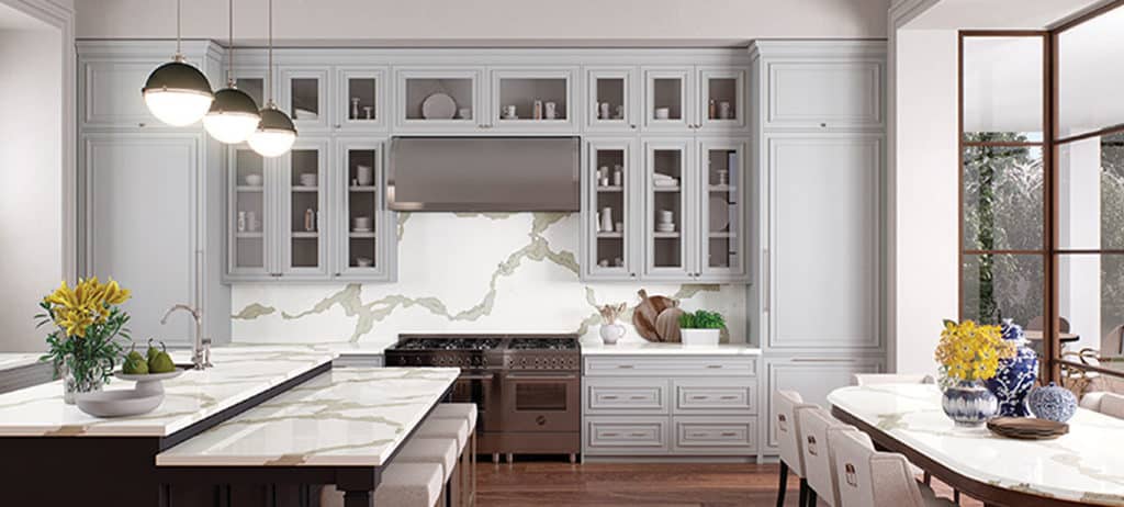 Caesarstone 1 Modern kitchen featuring marble counters and island