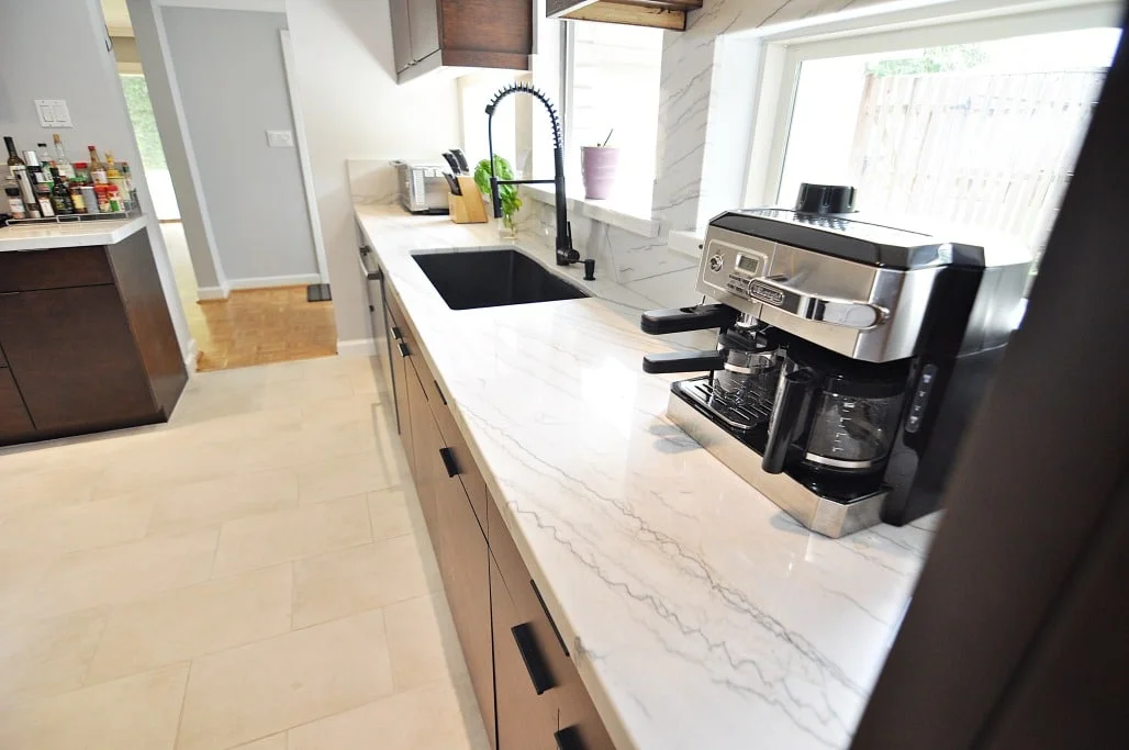 Coffee station with MSI White Macaubas countertop and chocolate finish cabinets Houston TX