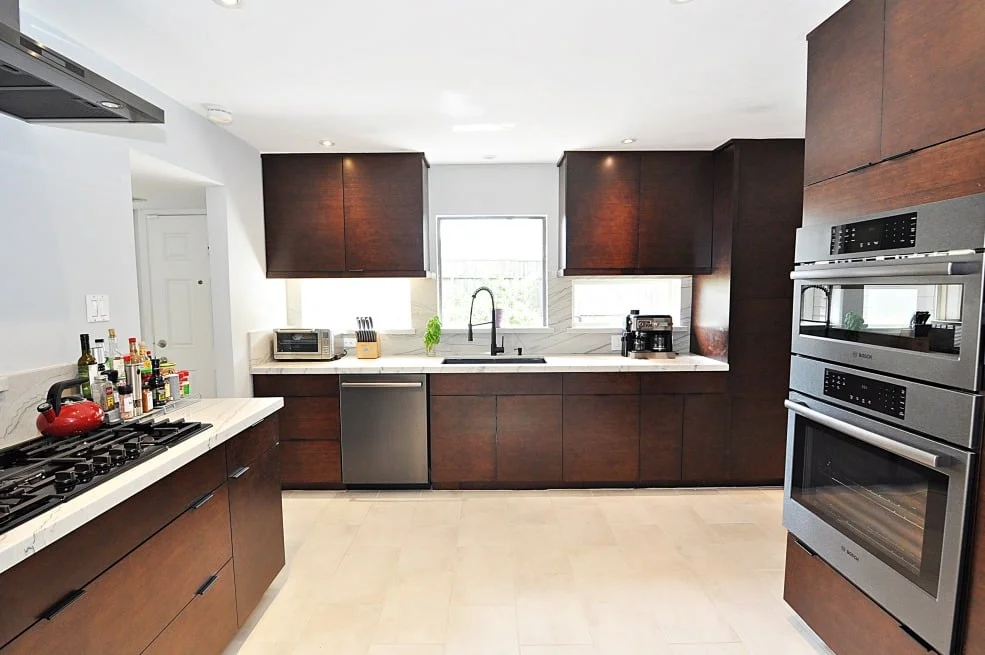Complete kitchen transformation with Ultracraft cabinets designed by Tony Kaplan Houston