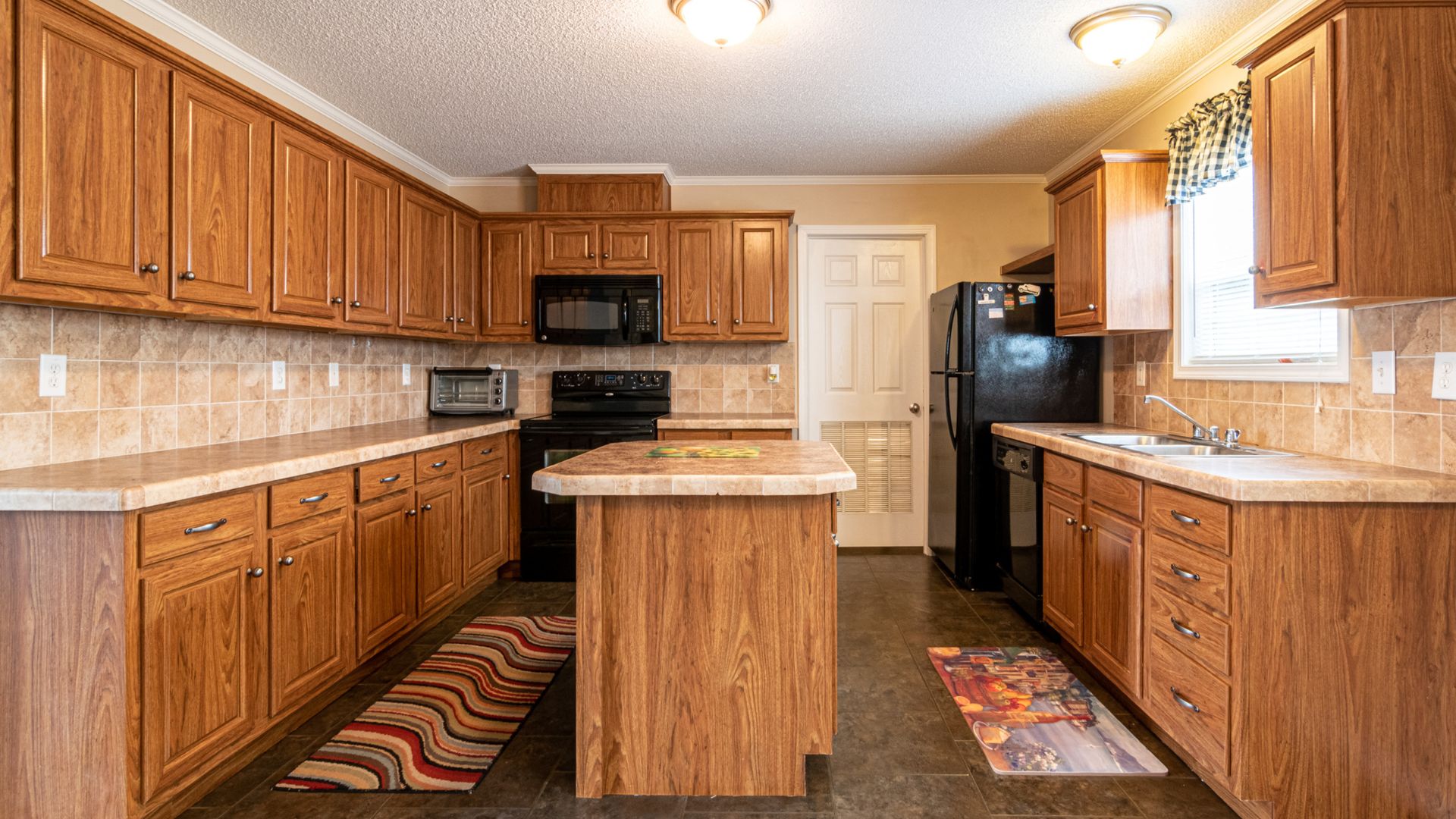 Cabinetry 30 kitchen with wooden cabinets and black appliances