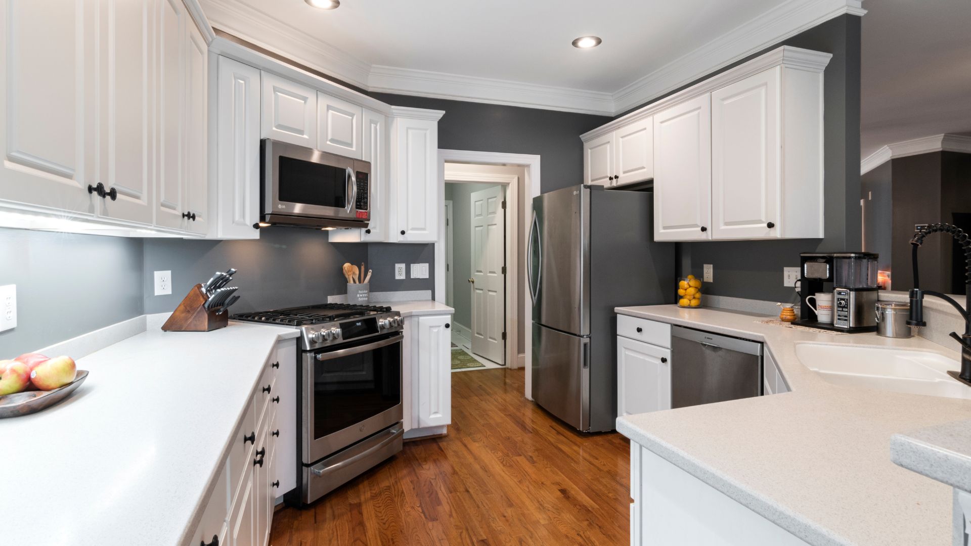 Cabinetry 2 White kitchen cabinets with a beautiful sink
