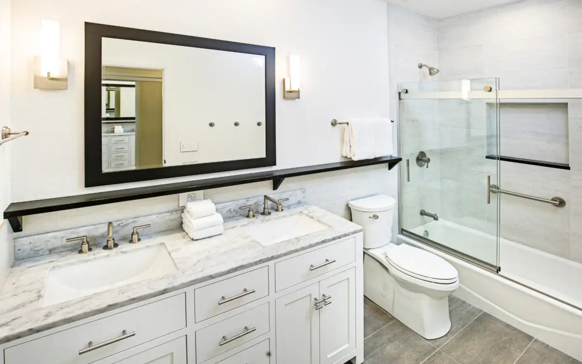 statement making vanities in white bathroom