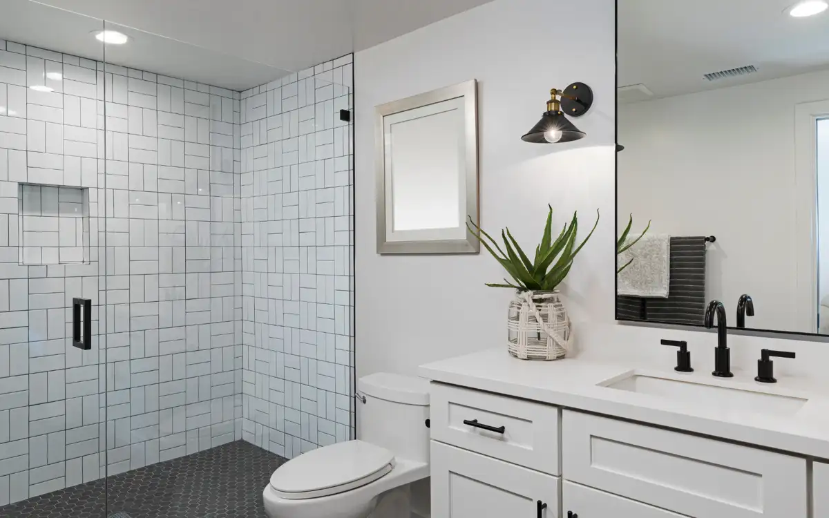 bath with white styling tiles