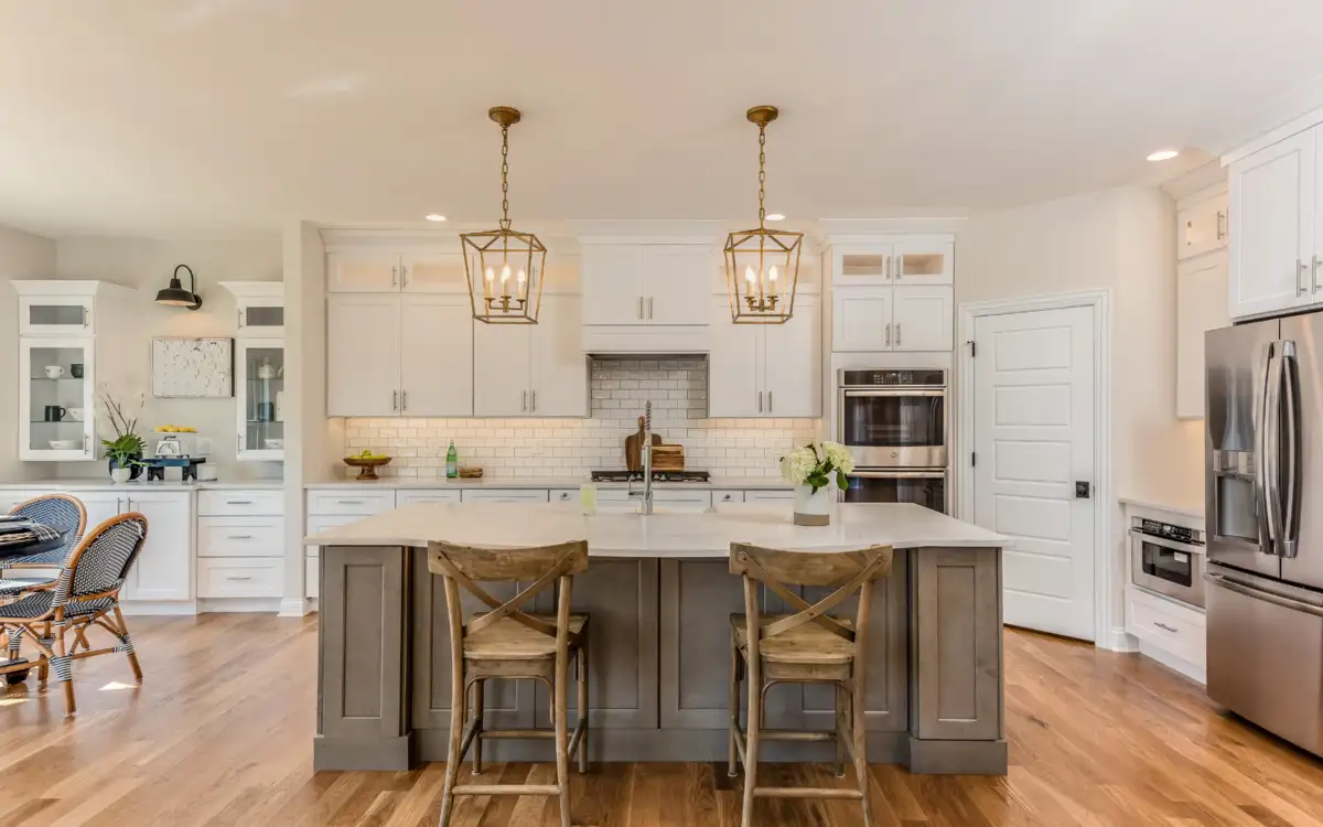 Top Transitional Kitchen Design Ideas for A Timeless Look 5 lighting is used as a kitchen decor