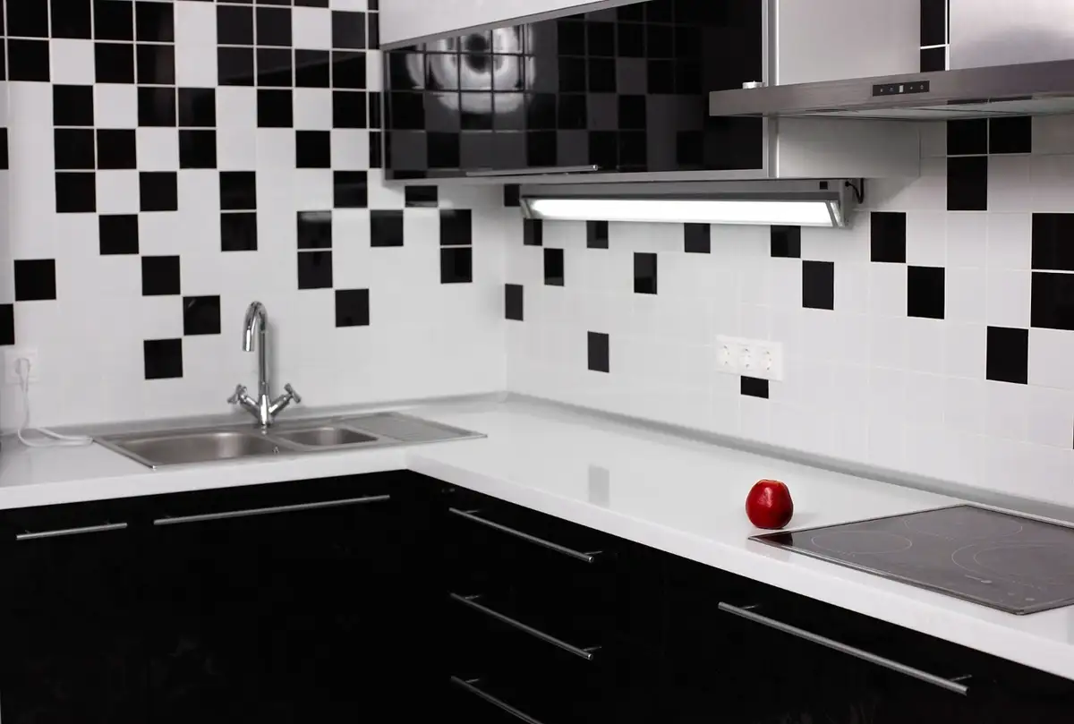 black cabinets with white tiles