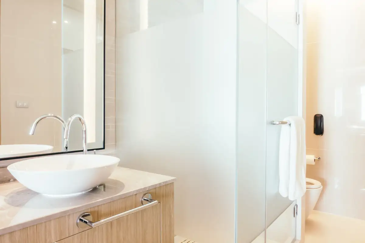 22 Stylish Walk-In Shower Ideas in 2025 5 Glass Panels with Concealed Hardware Walk-in Shower
