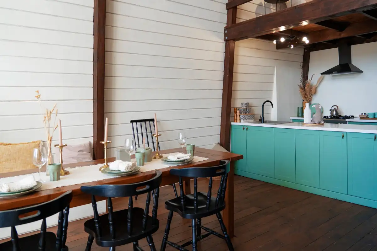 turquoise blue cabinets and wooden details in kitchen