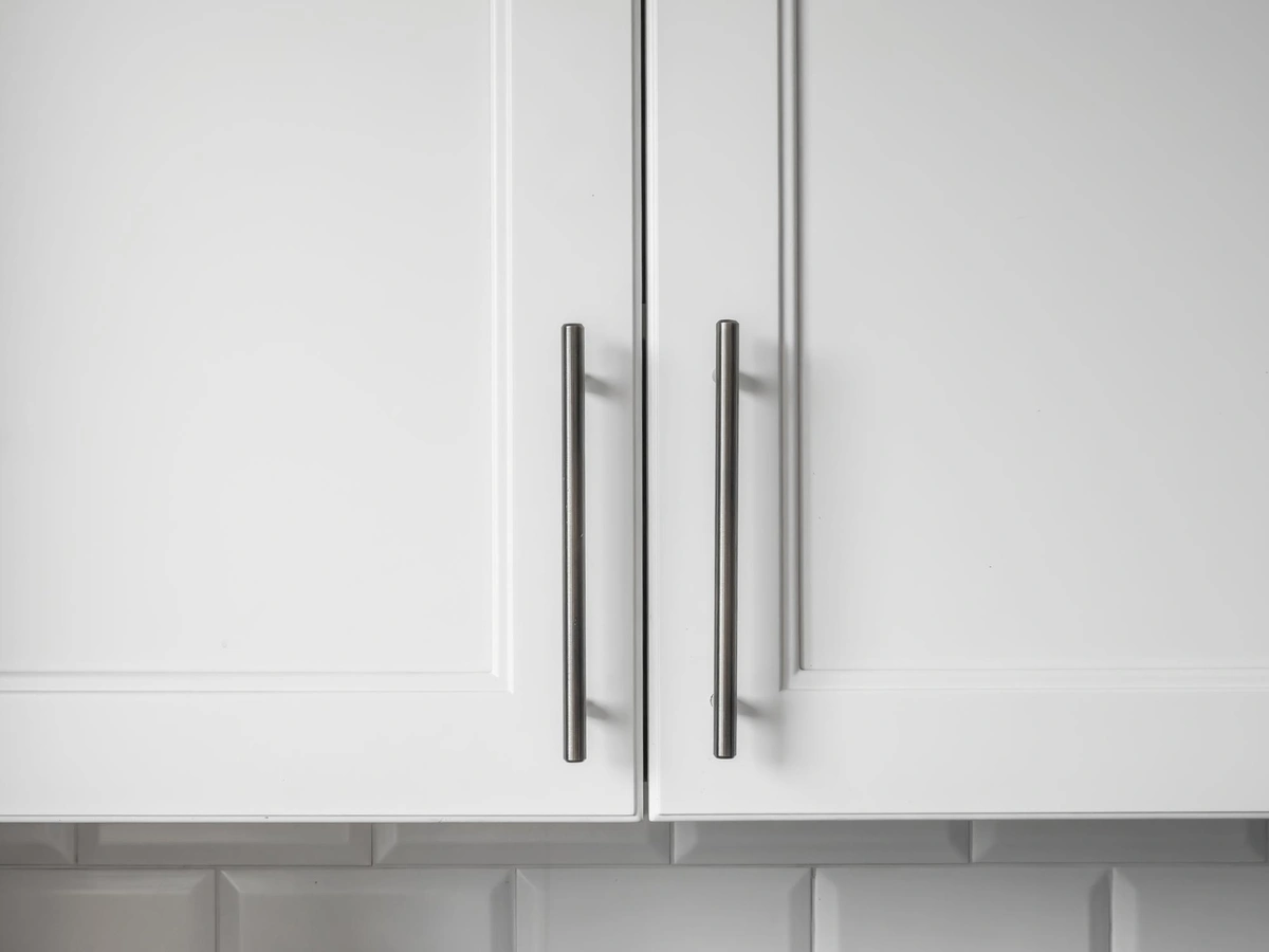 white kitchen cabinets with matte finishes