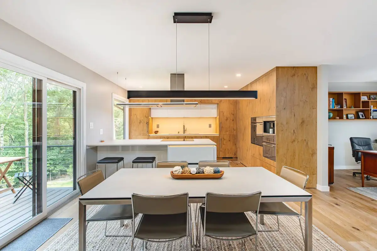A kitchen designed with light color to make it look bigger