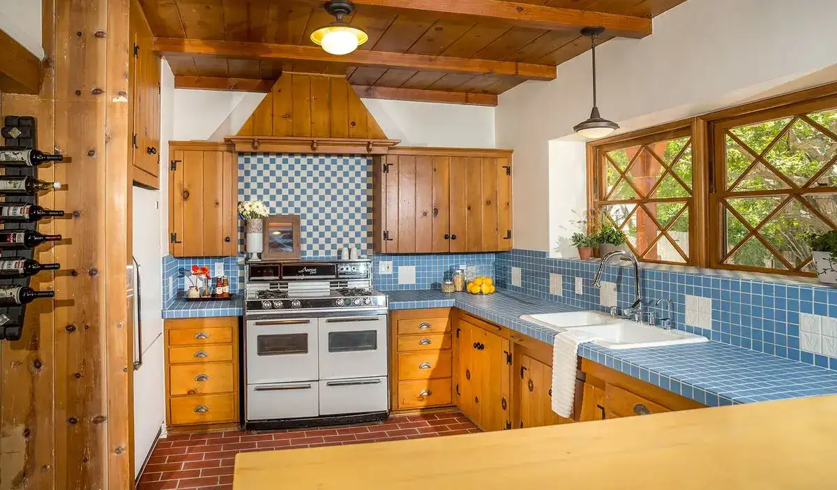 rustic kitchen design with blue ceramic tile countertop