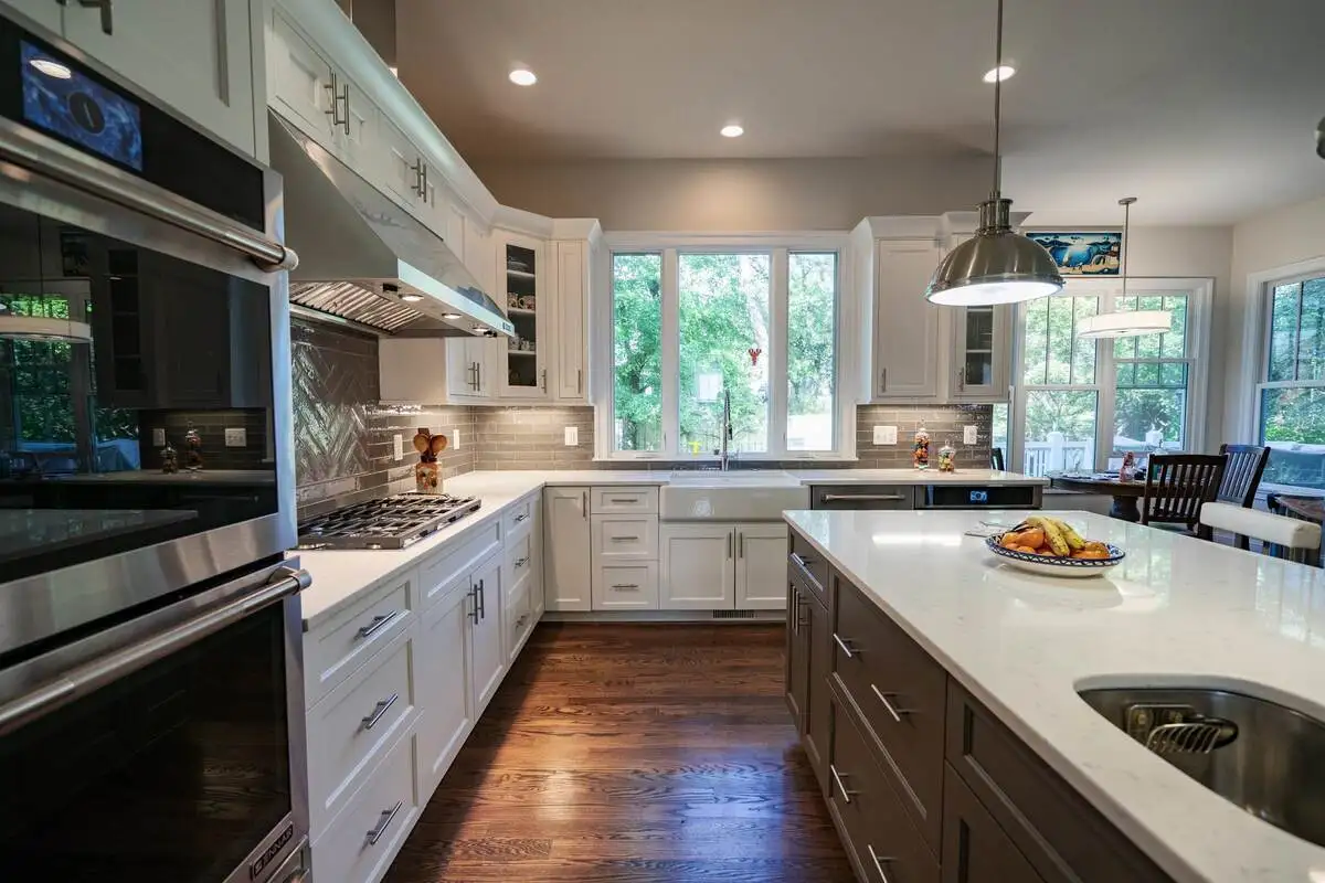well lighted white color stylish kitchen